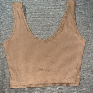 Medium tan tank top.